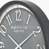 Black Wood Effect Black Faced Round Wall Clock